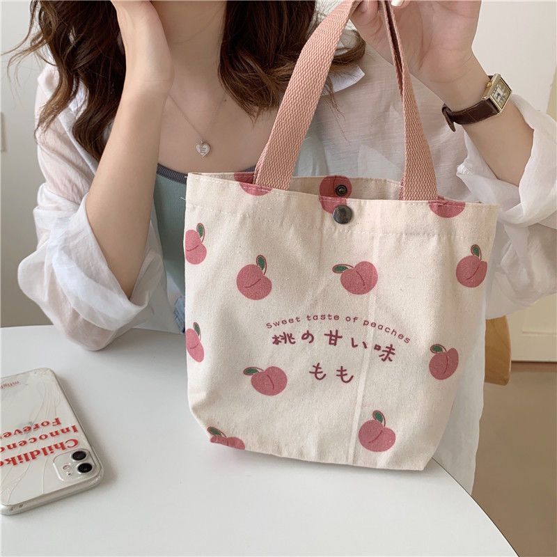 bag female 2021 new pouch japanese peach portable canvas bag girl snack bento small bag handbag