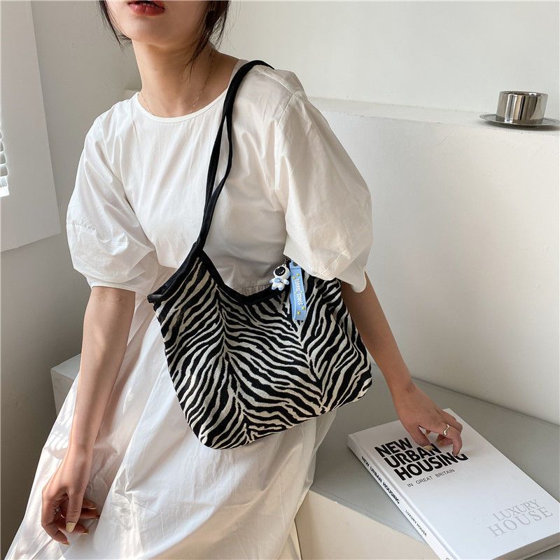 Korean Style Zebra Pattern Large Capacity Idle Style Ins Hand Carrying Shoulder Bag Shopping Bag Simple Artistic Canvas Schoolbag for Women