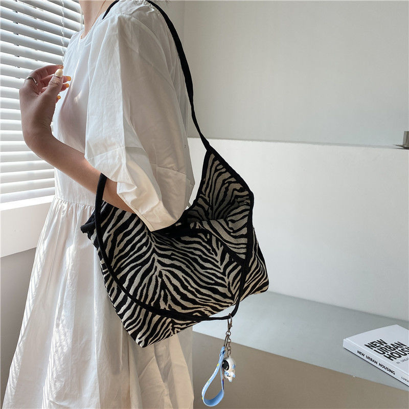 Korean Style Zebra Pattern Large Capacity Idle Style Ins Hand Carrying Shoulder Bag Shopping Bag Simple Artistic Canvas Schoolbag for Women