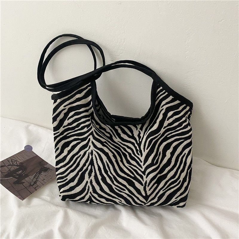 Korean Style Zebra Pattern Large Capacity Idle Style Ins Hand Carrying Shoulder Bag Shopping Bag Simple Artistic Canvas Schoolbag for Women