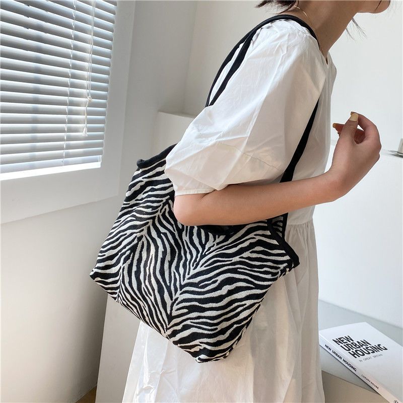 Korean Style Zebra Pattern Large Capacity Idle Style Ins Hand Carrying Shoulder Bag Shopping Bag Simple Artistic Canvas Schoolbag for Women