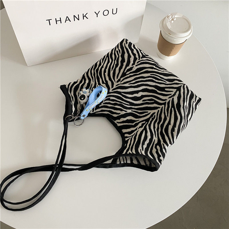 Korean Style Zebra Pattern Large Capacity Idle Style Ins Hand Carrying Shoulder Bag Shopping Bag Simple Artistic Canvas Schoolbag for Women