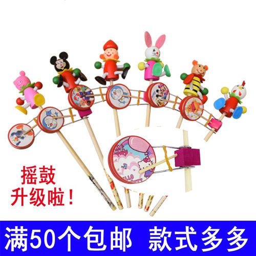 free shipping stall temple fair puppet hand swinging drum colorful cartoon swinging drum good selling children‘s toy puppet drum-shaped rattle swinging drum swinging drum