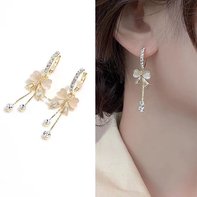 bow earrings 2024 new popular niche design high-grade light luxury tassel ear clip female graceful earrings