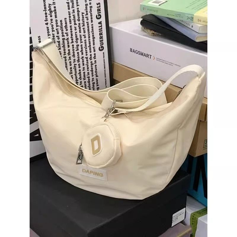 large-capacity crossbody bag female niche japanese style sports fitness canvas bag leisure commute dumpling bag sweet shoulder bag