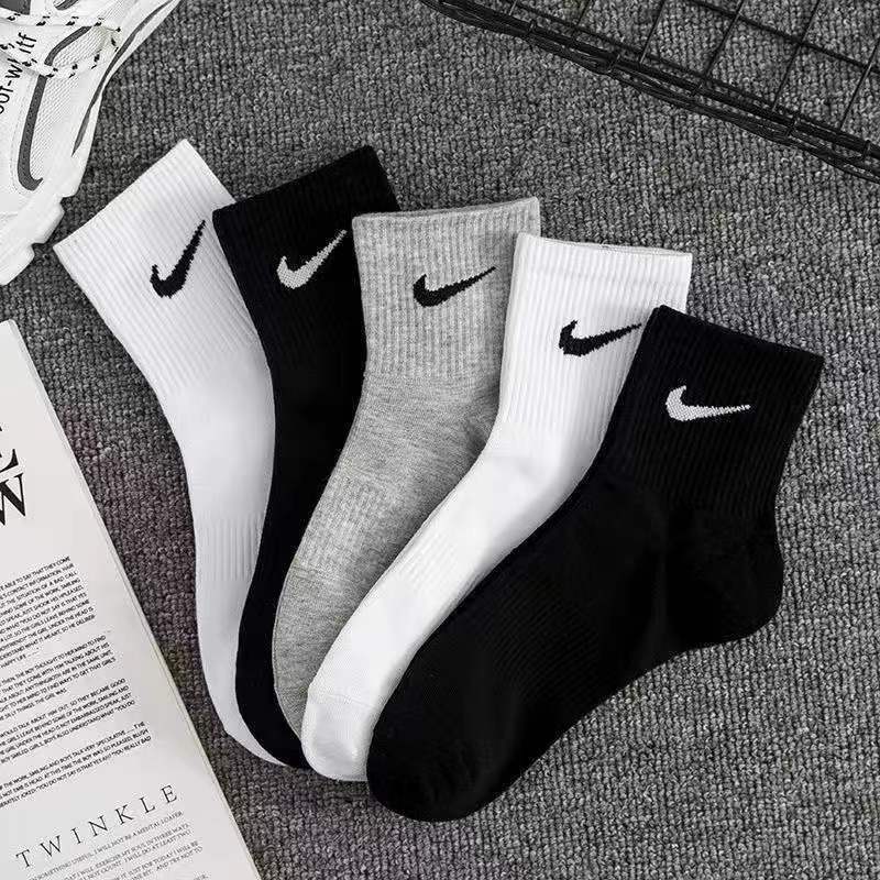 socks men‘s and women‘s ins trendy autumn and winter thick tube socks basketball sports thigh stocking cotton male student socks