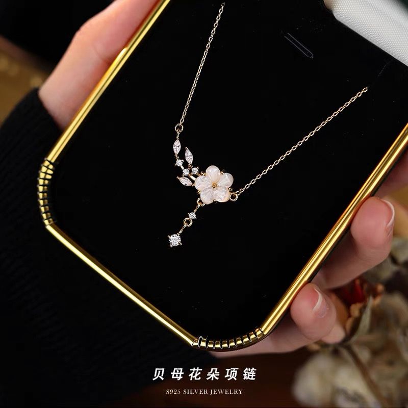 new chinese style plum shell necklace for women ins light luxury minority french style classic style peach blossom tassel clavicle chain advanced