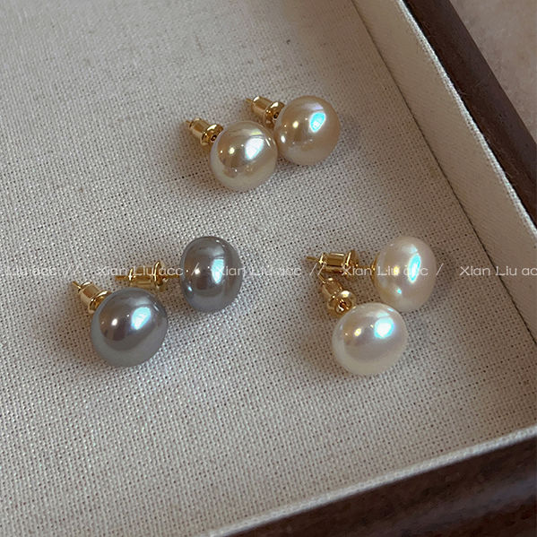 high-grade shijia steamed bread pearl stud earrings for women 2024 new western style light luxury temperament earrings autumn and winter silver pin earrings