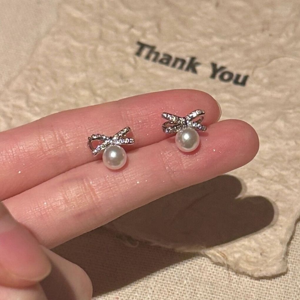 zhao lusi same pearl bow stud earrings women‘s flash light luxury minority elegant high-grade ins earrings earrings