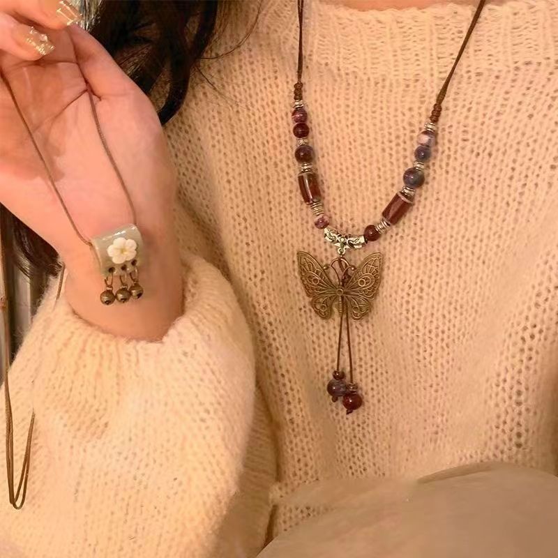 retro ethnic style ceramic butterfly bell pendant necklace for women 2024 new trendy long sweater chain ornament