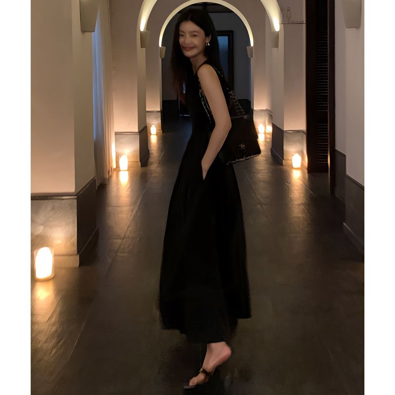 French-style black vest dress women's 2023 spring and summer high-end temperament mid-length slim wrap hip long skirt