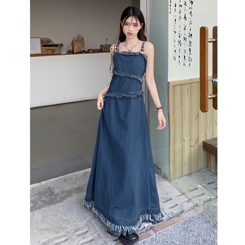 Manxiru early spring wear denim suspender skirt long section niche design sense fringe raw edge summer dress female