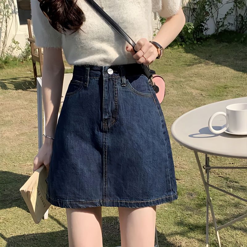 Solid color retro denim skirt for women's summer new Korean high waisted slimming versatile wrap buttocks A-line short skirt is trendy