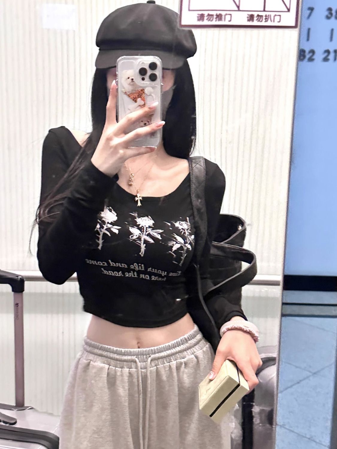 純欲風甜辣妹黑色鏤空露背t恤女秋季修身顯瘦設計感長袖短款上衣