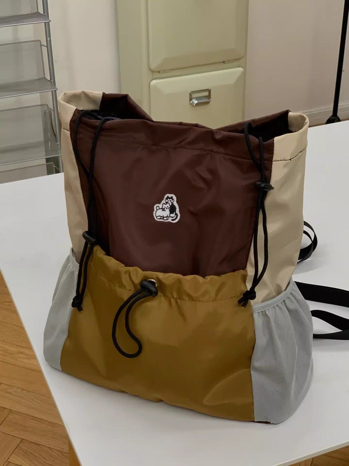 Early autumn college students attend class drawstring backpack, retro style contrast color large capacity bag 2023 new contrast color school bag