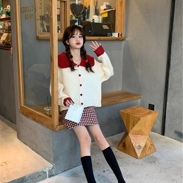 This year's popular and beautiful design contrasting color doll collar sweater autumn and winter tops women's new long-sleeved cardigan trend