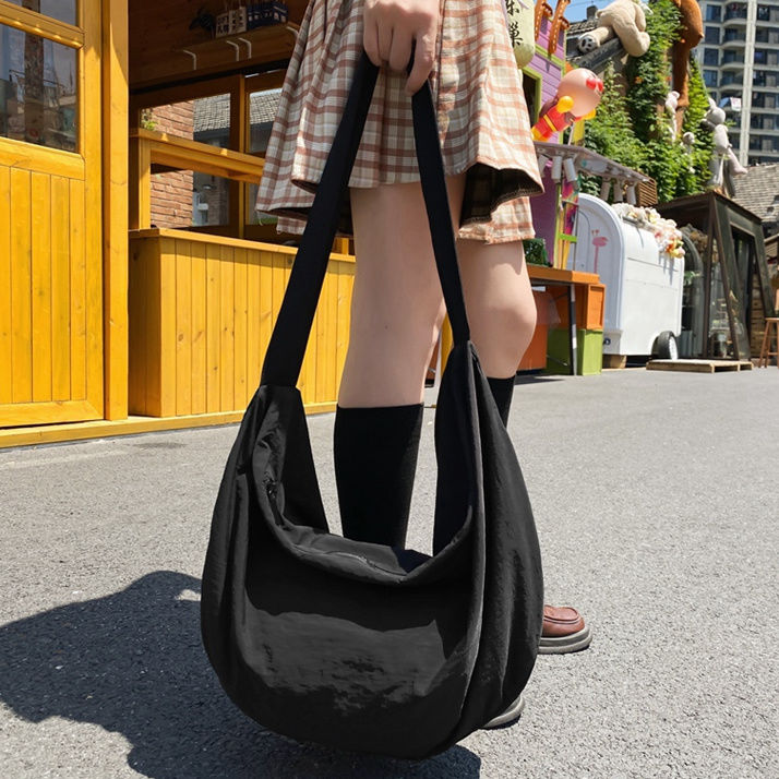 韓版大容量慵懶風帆布包女2023新款休閒百搭尼龍布單肩斜挎包學生