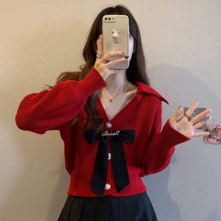 法式娃娃領針織毛衣女2023秋冬新款設計感小眾蝴蝶結長袖短款上衣