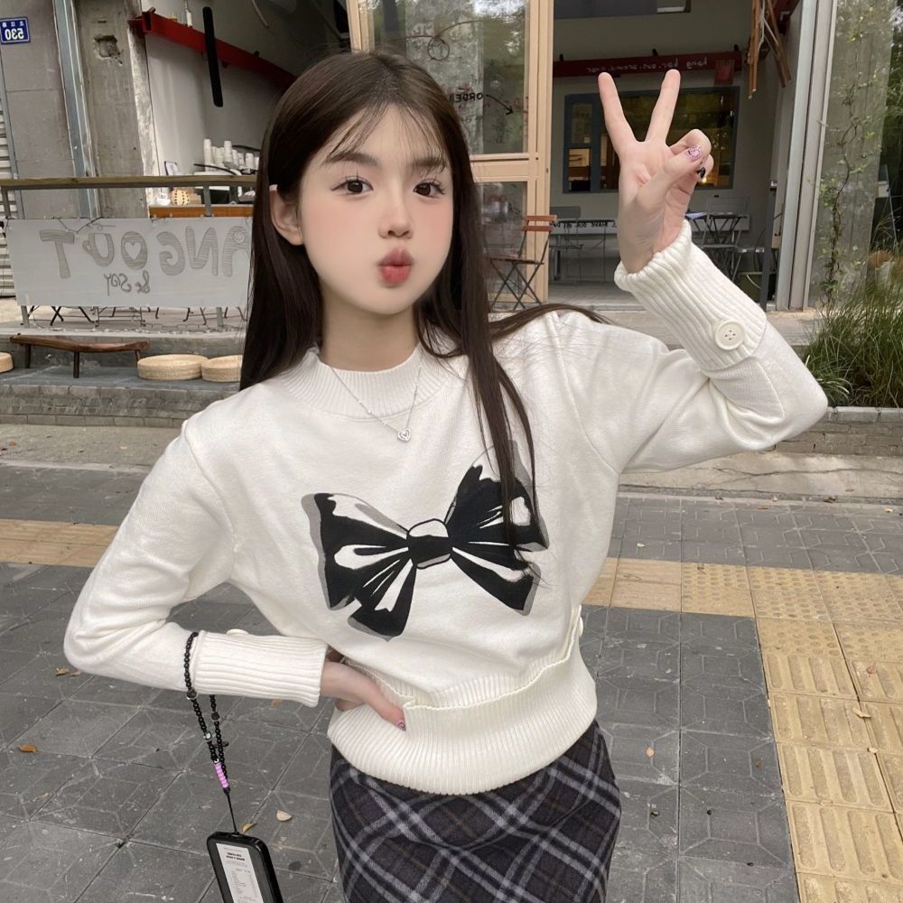 辣妹2023年秋冬美式學院風蝴蝶結收腰毛衣針織寬鬆長袖打底上衣女