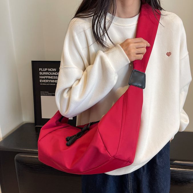 大容量帆布包女包包2023新款休閒百搭尼龍餃子包旅遊運動斜挎包潮