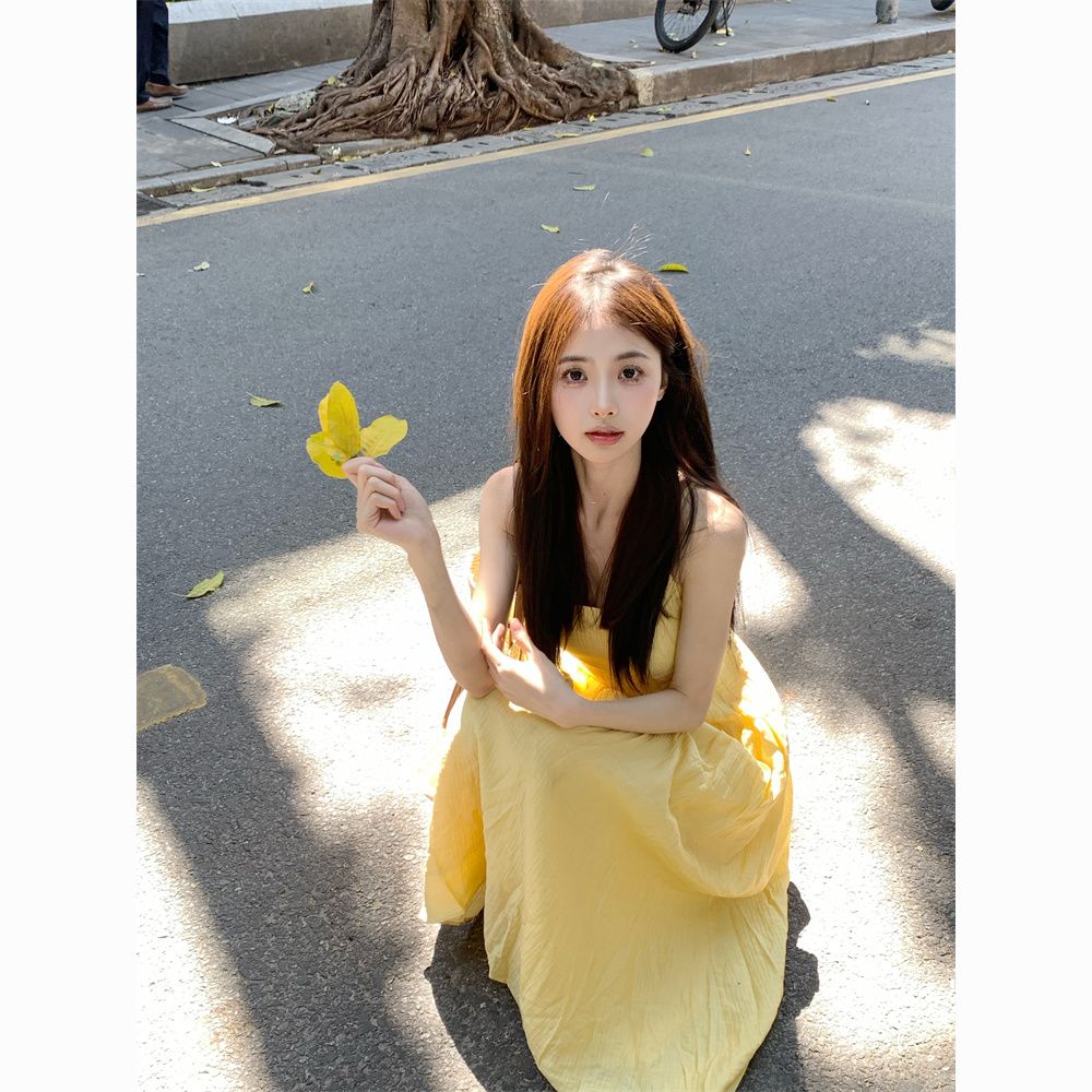 Gentle style yellow suspender dress for women summer French style waist slimming A-line skirt seaside vacation long dress