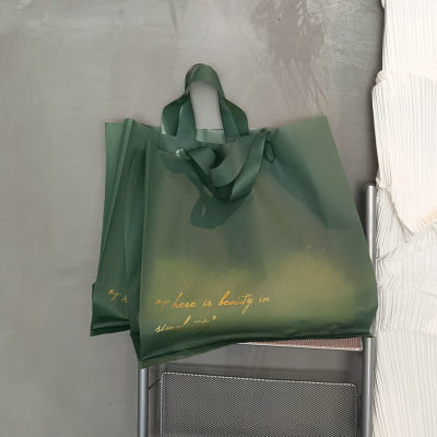 复古绿服装店袋子高档磨砂手提塑料礼品包装衣服购物定制袋袋兴龙