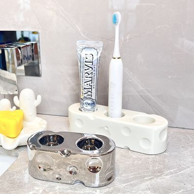 电动牙刷牙膏奶酪置物架底座家用浴室梳子洗手台厕所摆台式收纳架
