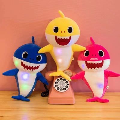 亚马逊速卖通Baby公仔鲨鱼玩具宝宝玩偶儿童发光唱歌毛绒玩具可爱