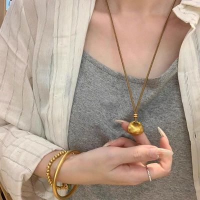 黄金色小胖福项链女新中式金坨坨吊坠福袋咖色编绳毛衣链复古时尚
