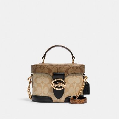 COACHޢŮʿʽʱСڳбӰ979Ԫ