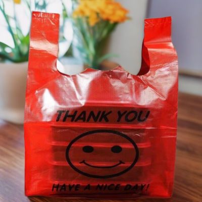 红色笑脸袋手提式一次性购物袋环保家庭收纳袋市场饭店外卖方便袋