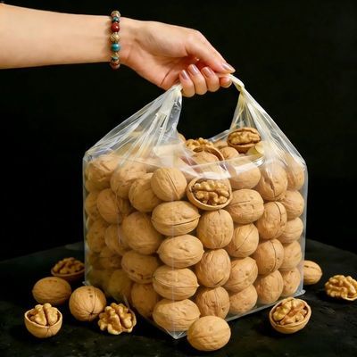 正宗薄皮核桃新疆特产原味大果坚果休闲零食袋装包邮薄壳