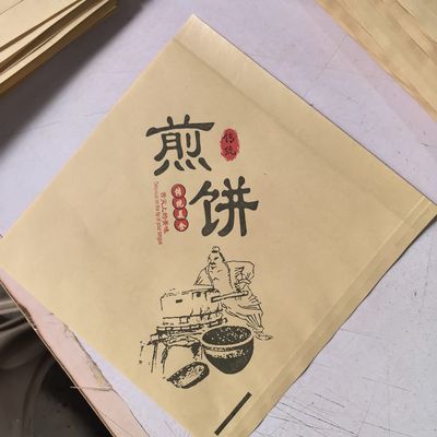 牛皮纸淋膜防油纸袋三角袋煎饼果子纸袋一次性纸袋