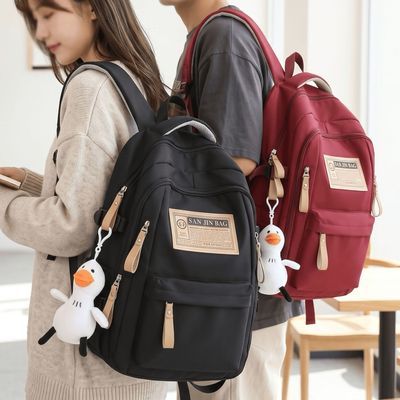 书包男轻便防泼水初高中大学生韩版双肩包大容量出行百搭背包女