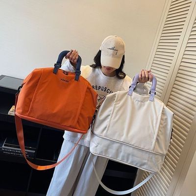 正品原创大容量短途旅行包女健身包旅游出差住校收纳包行李袋男