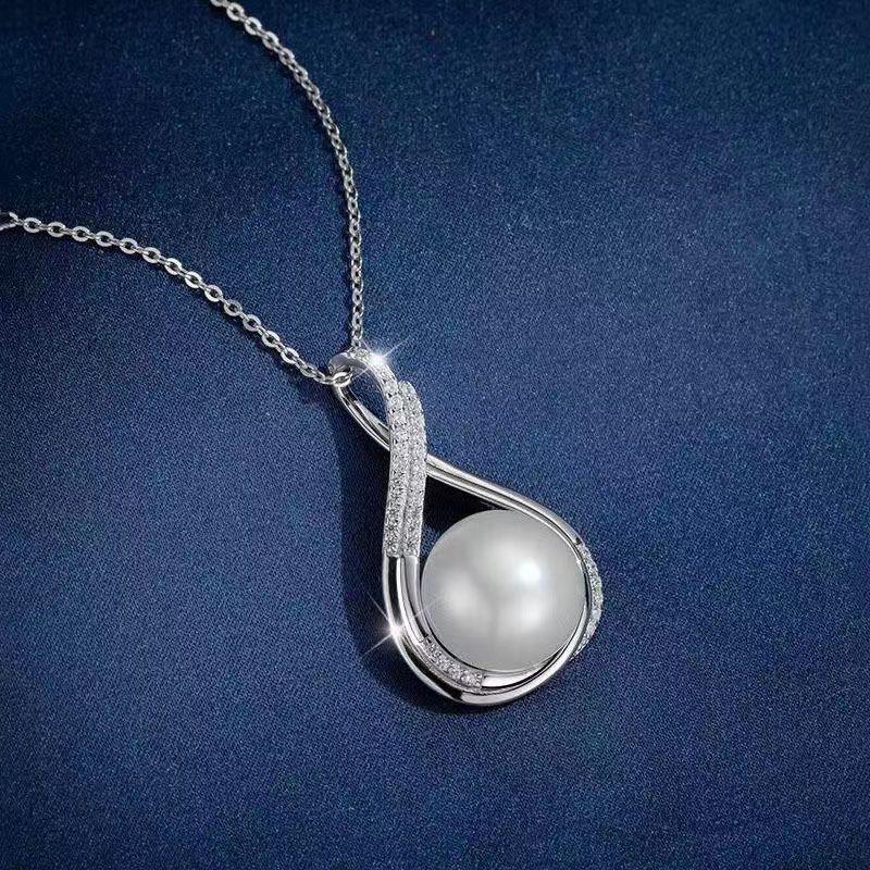 Elegant smykkesæt i 925 sølv med ferskvandsperler til kvinder_voghion.com