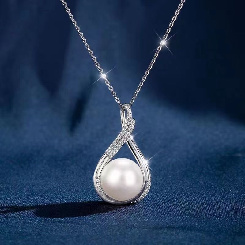 Elegant smykkesæt i 925 sølv med ferskvandsperler til kvinder_voghion.com