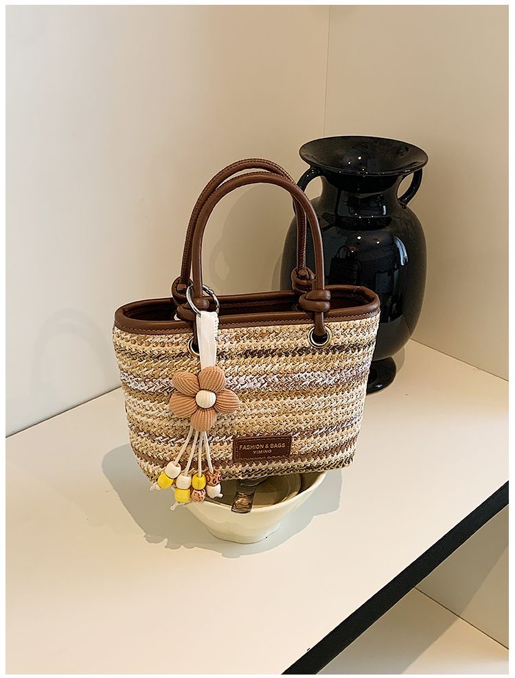 Borsa a secchiello in paglia intrecciata donna, borsa a righe_voghion.com