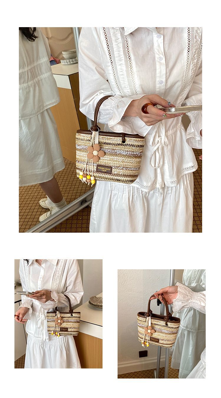 Borsa a secchiello in paglia intrecciata donna, borsa a righe_voghion.com