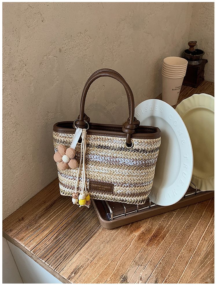 Borsa a secchiello in paglia intrecciata donna, borsa a righe_voghion.com