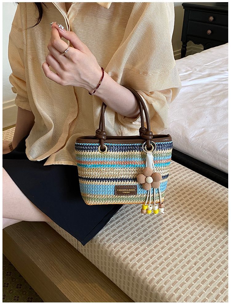 Borsa a secchiello in paglia intrecciata donna, borsa a righe_voghion.com