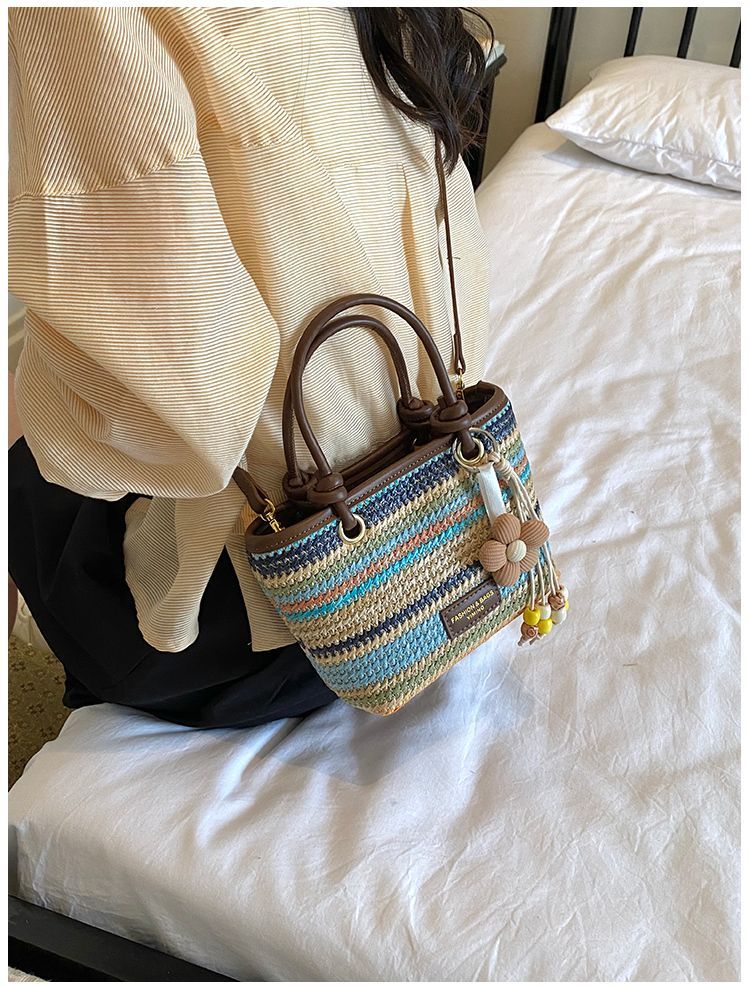 Borsa a secchiello in paglia intrecciata donna, borsa a righe_voghion.com