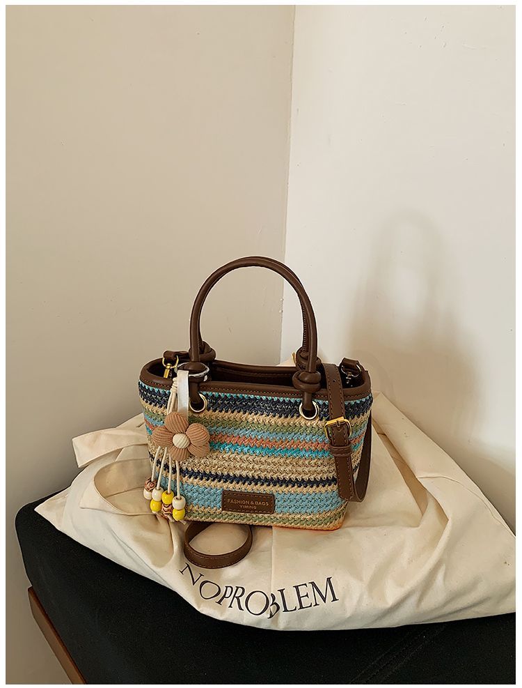 Borsa a secchiello in paglia intrecciata donna, borsa a righe_voghion.com