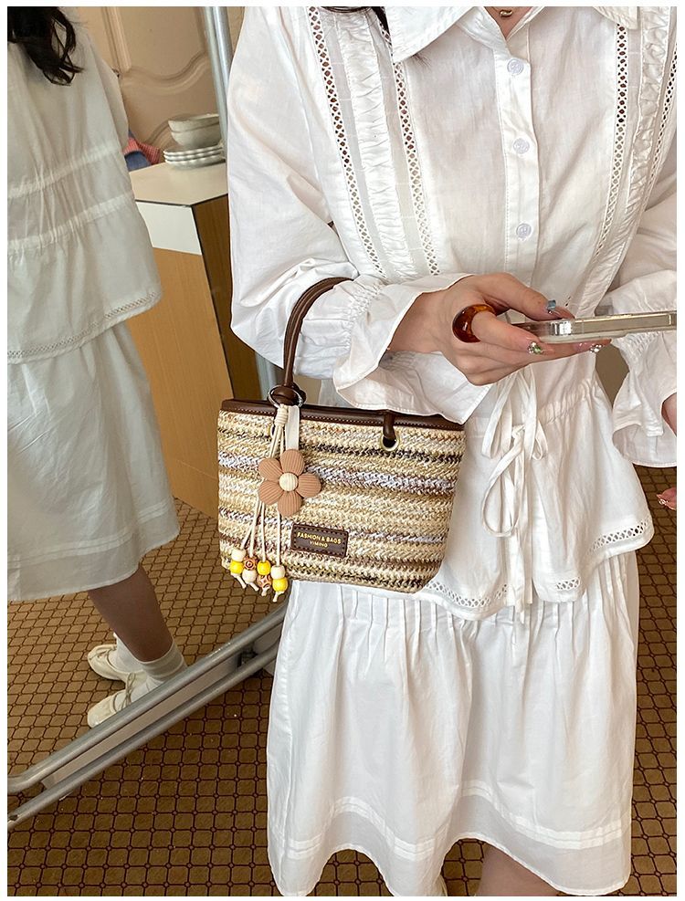 Borsa a secchiello in paglia intrecciata donna, borsa a righe_voghion.com