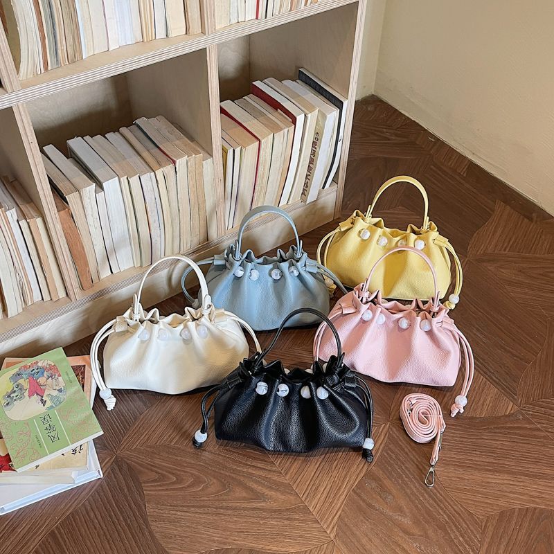 This Year's Popular Versatile Cloud Handbag Is The 2026 New Summer Fashion Niche Textured Commuter Shoulder And_voghion.com