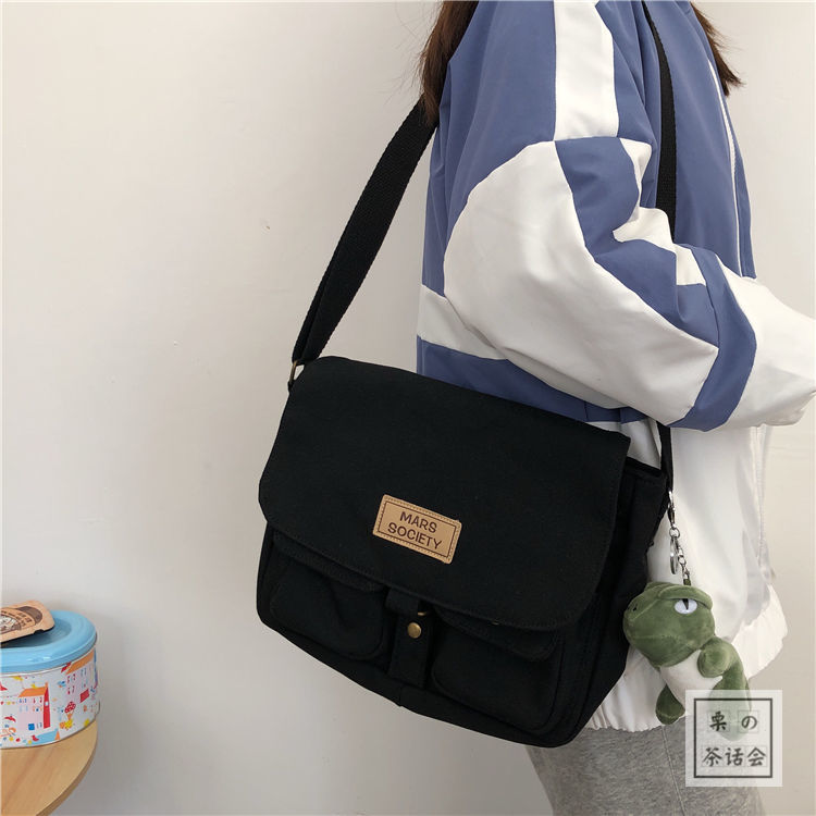 Japanese Harajuku wind work suit messenger bag female Korean ins retro student canvas bag Art College style postman bag