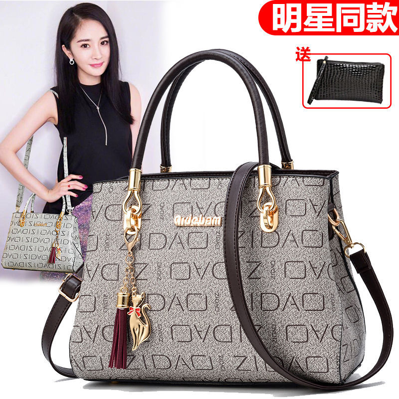 真皮質感女包2023新款大氣百搭女士手提包時尚印花單肩斜挎大包潮