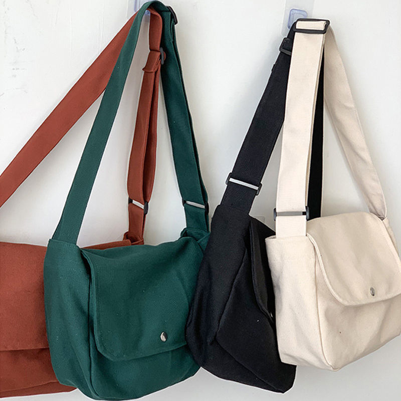 Korean casual flip messenger bag simple and versatile Art Canvas Shoulder Bag schoolbag retro couple postman bag