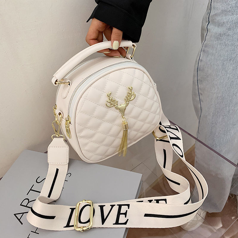 Bag women's new net red embroidery wide band tassel single shoulder slant cross versatile fashion portable small round bag