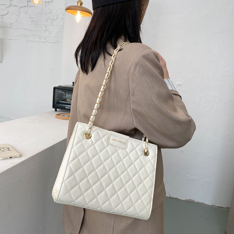 女包包2020新款潮今年流行法式小众设计菱格斜挎包法国质感单肩包